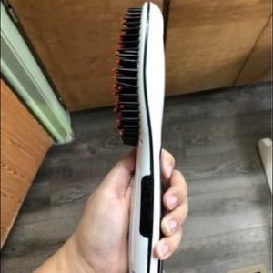 Hair straightening brush.